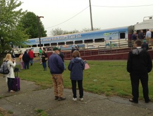 Greeted by a cheerful crowd at Buzzards Bay